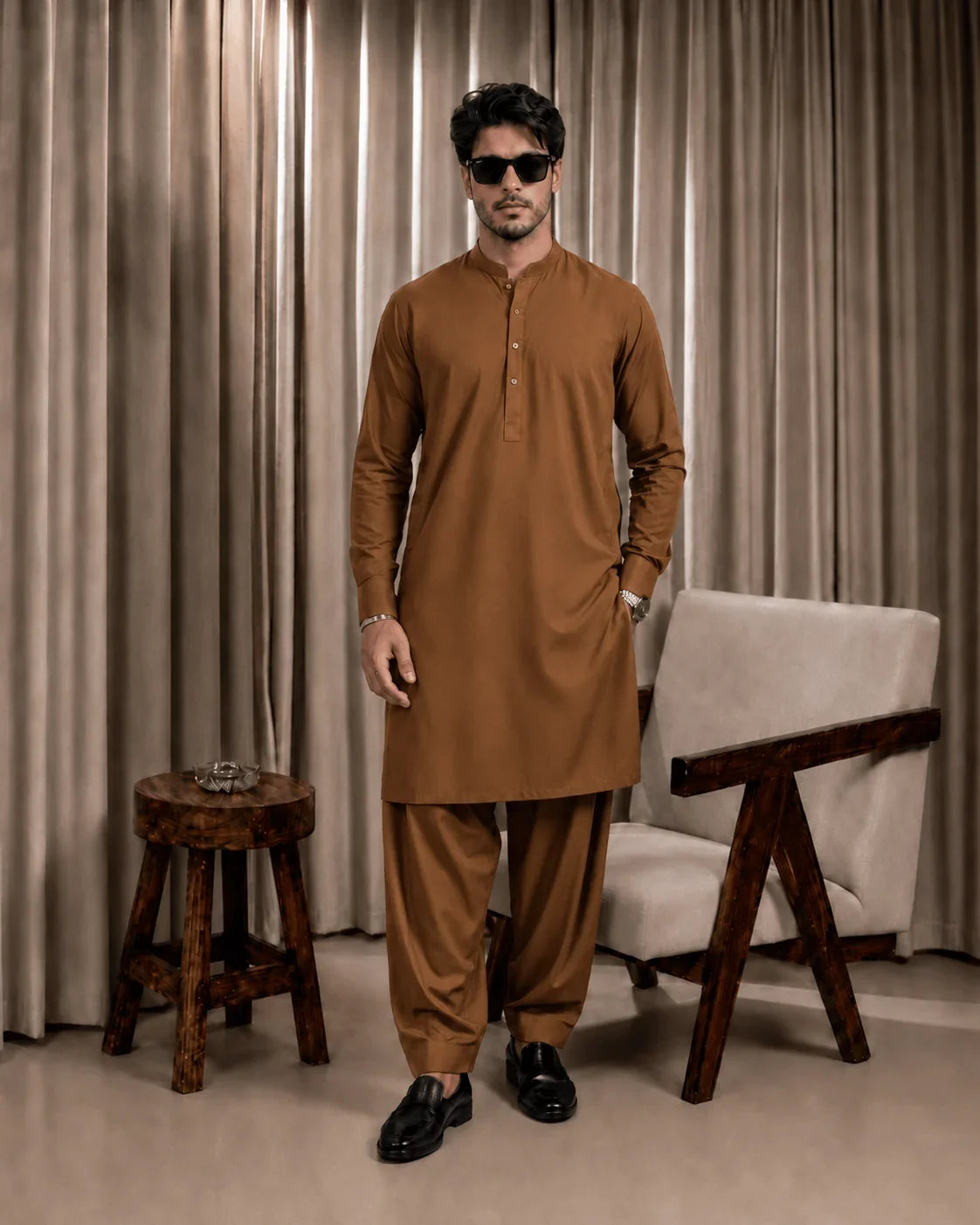 Men's brown unstitched suiting fabric set for formal and festive wear, featuring a kurta and shalwar